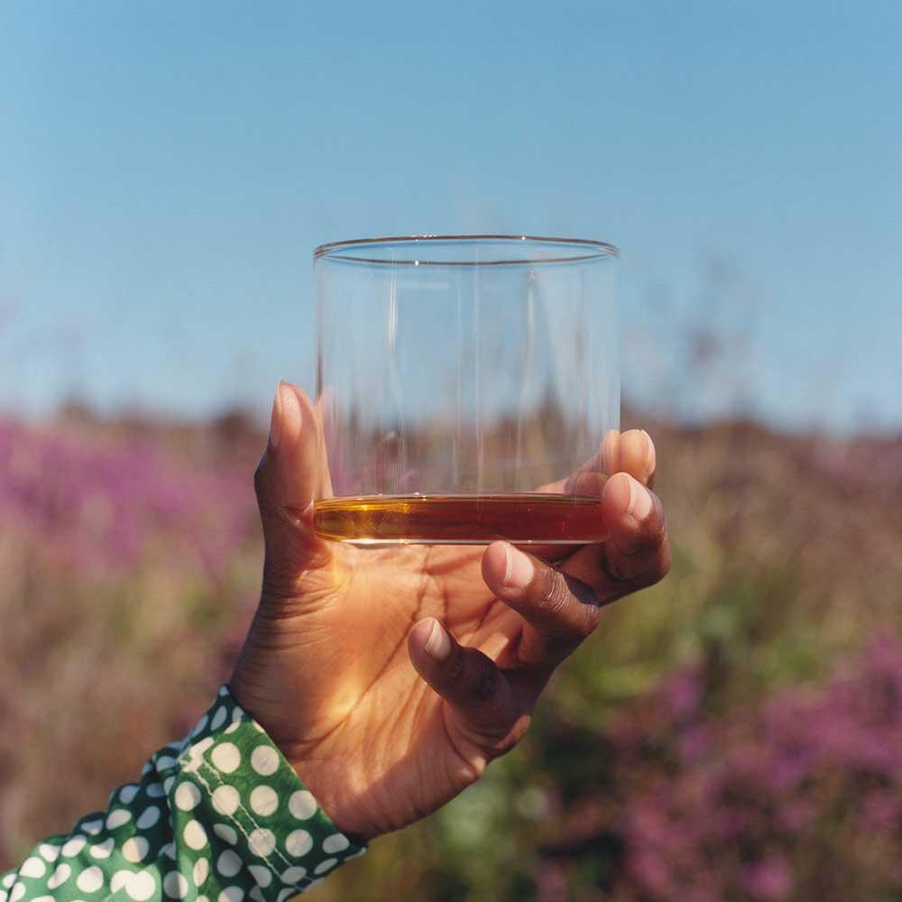 12 Year Old Glass in hand