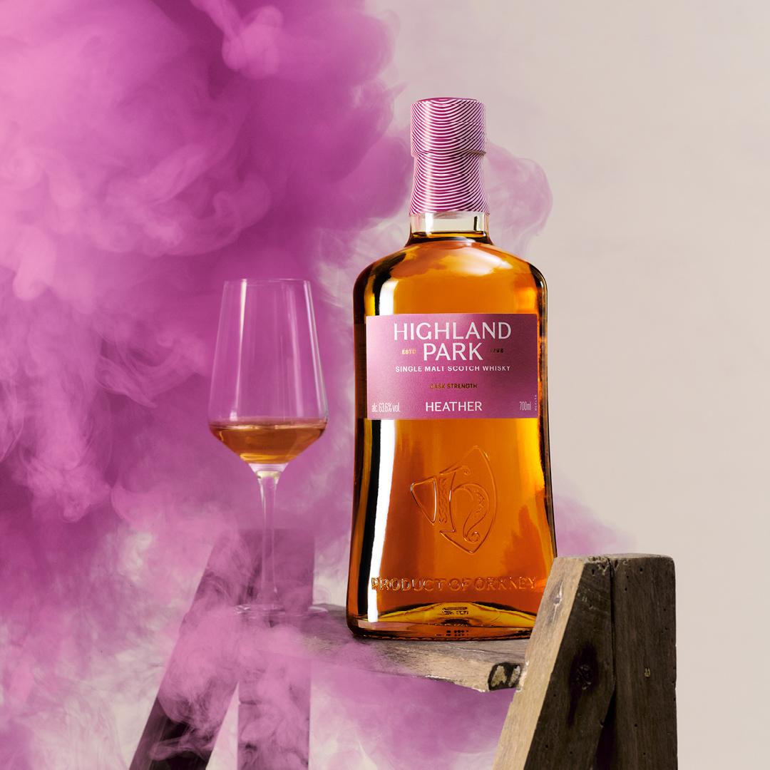Highland Park Cask Strength Heather bottle and heather coloured smoke
