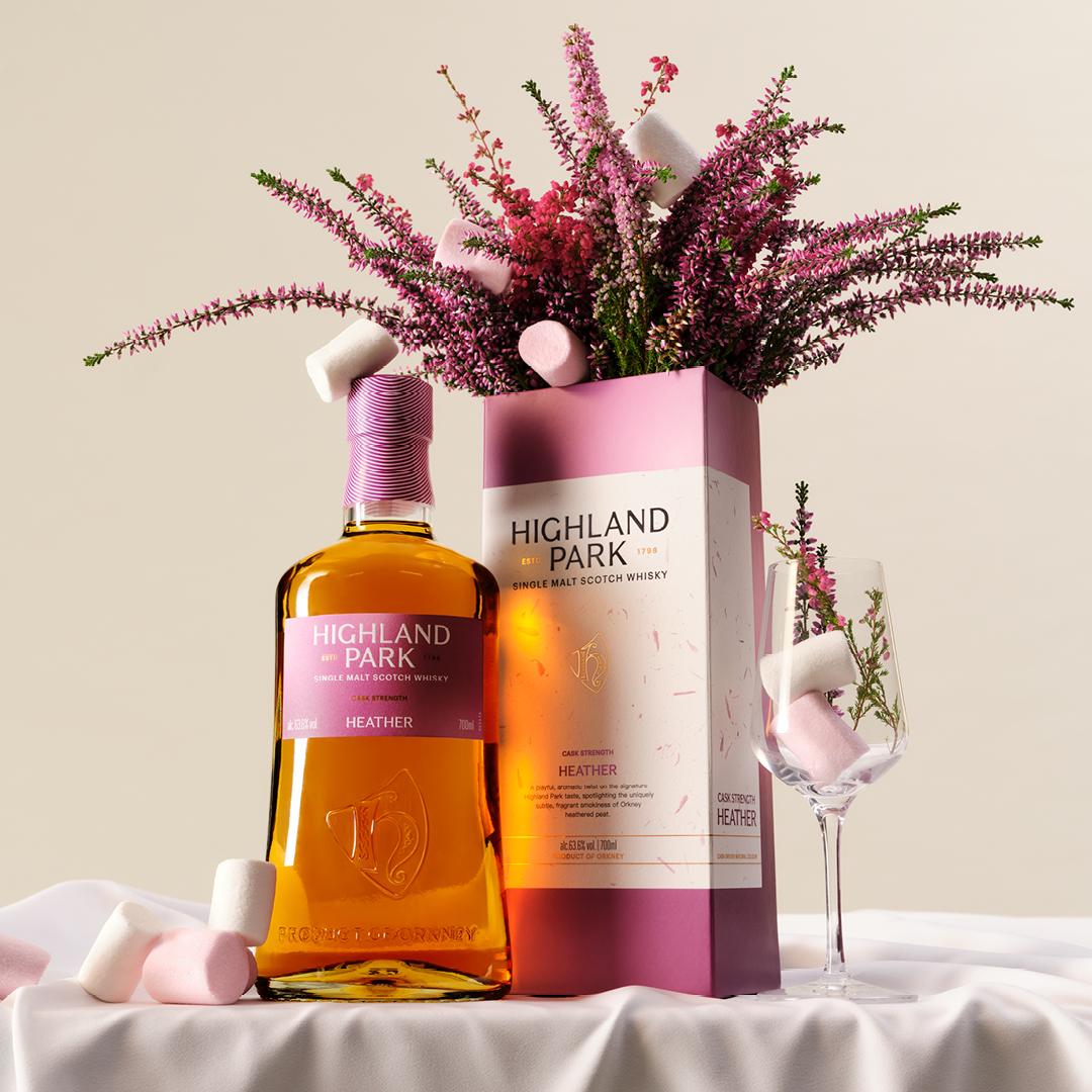 Highland Park Cask Strength Heather bottle and pack with heather and marshmallows