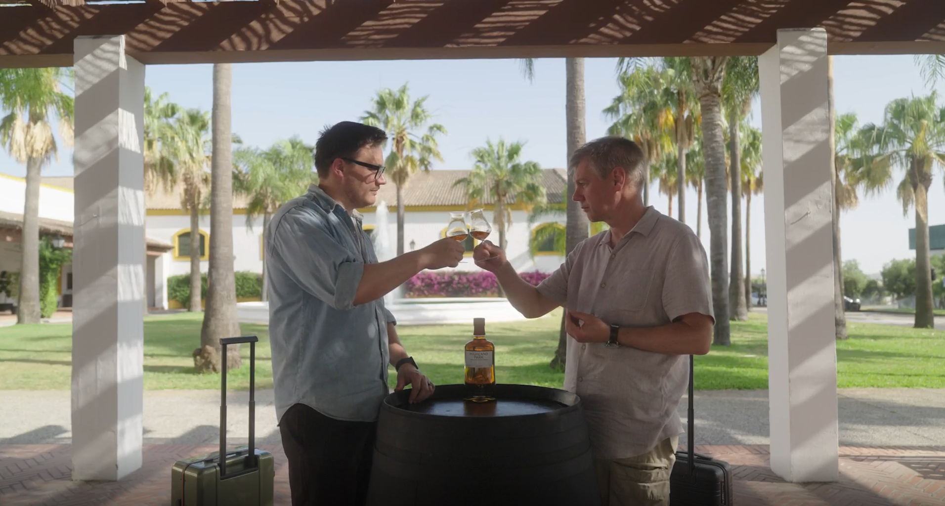 Master Whisky Makers, Gordon Motion and Marc Watson in cheers glasses of Sherry Skies in Jerez